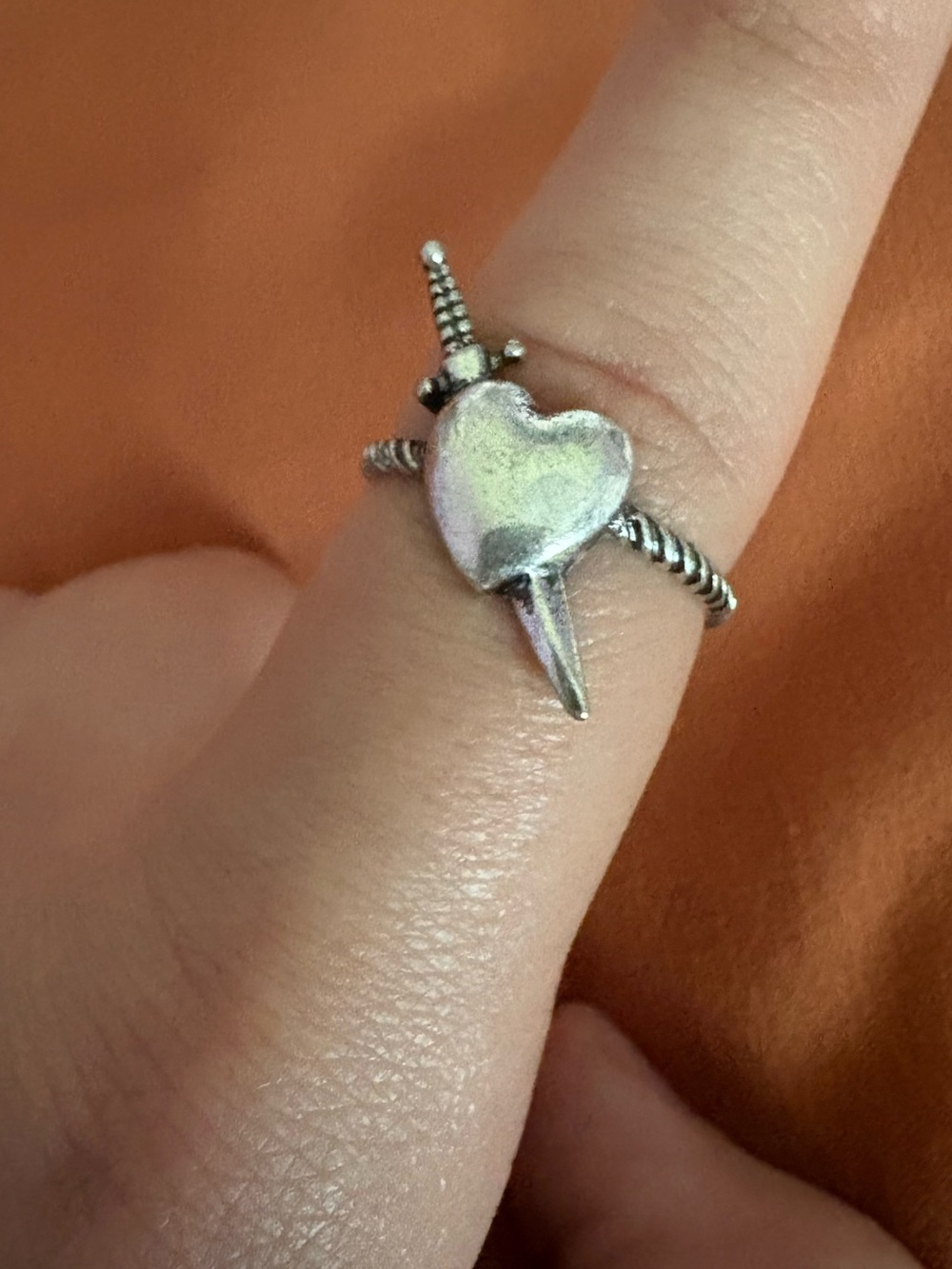 Silver heart and dagger ring